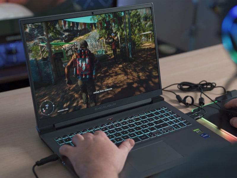 Rows of gaming PCs with neon lighting